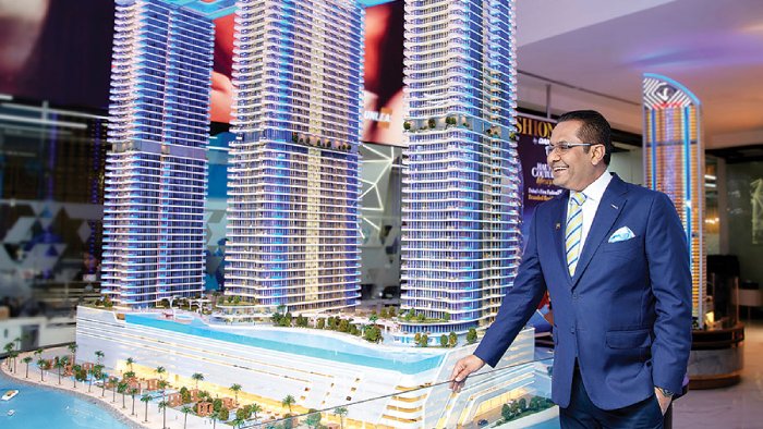 Danube founder Rizwan Sajan with a model of Oceanz behind him
