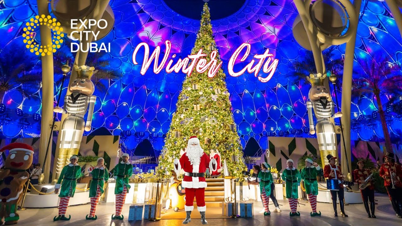 Winter City Expo City with Santa Clause and Elves standing in front of a huge Christmas Tree