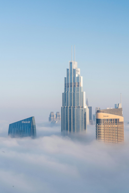 Downtown Dubai buildings with Emaar on then on a cloudy day