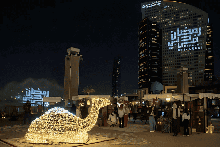 A lit up camel sculpture