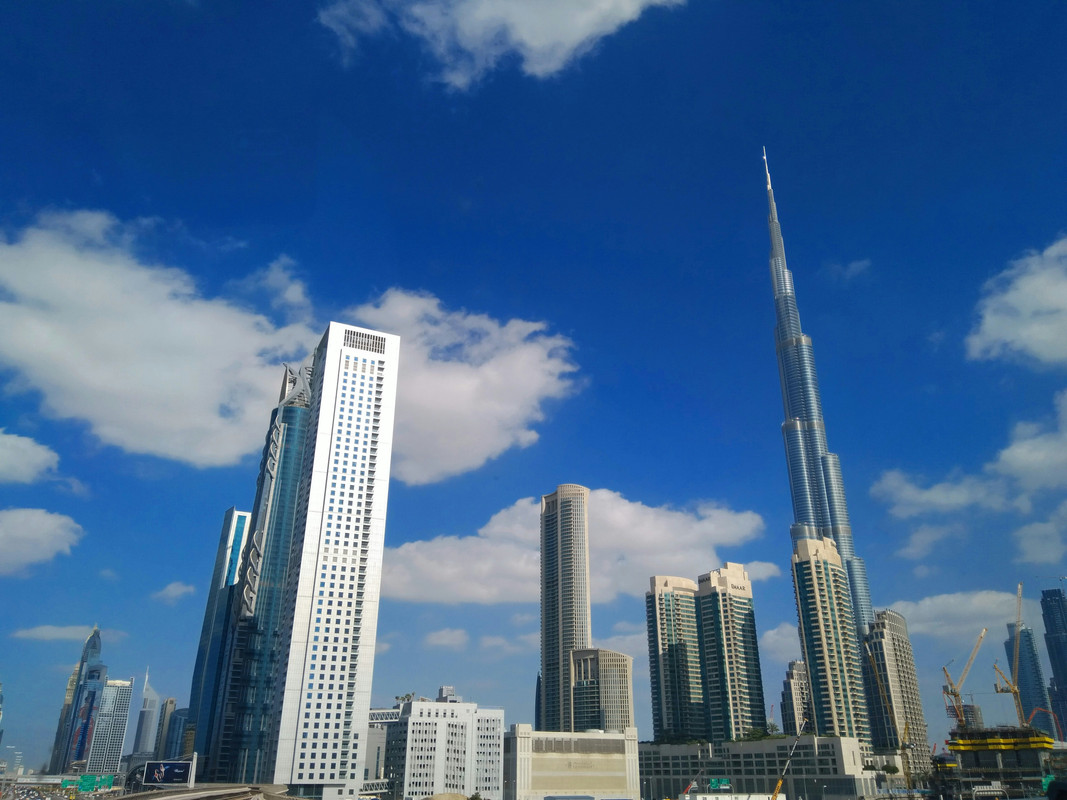 Downtown Dubai skyline on a bright day.