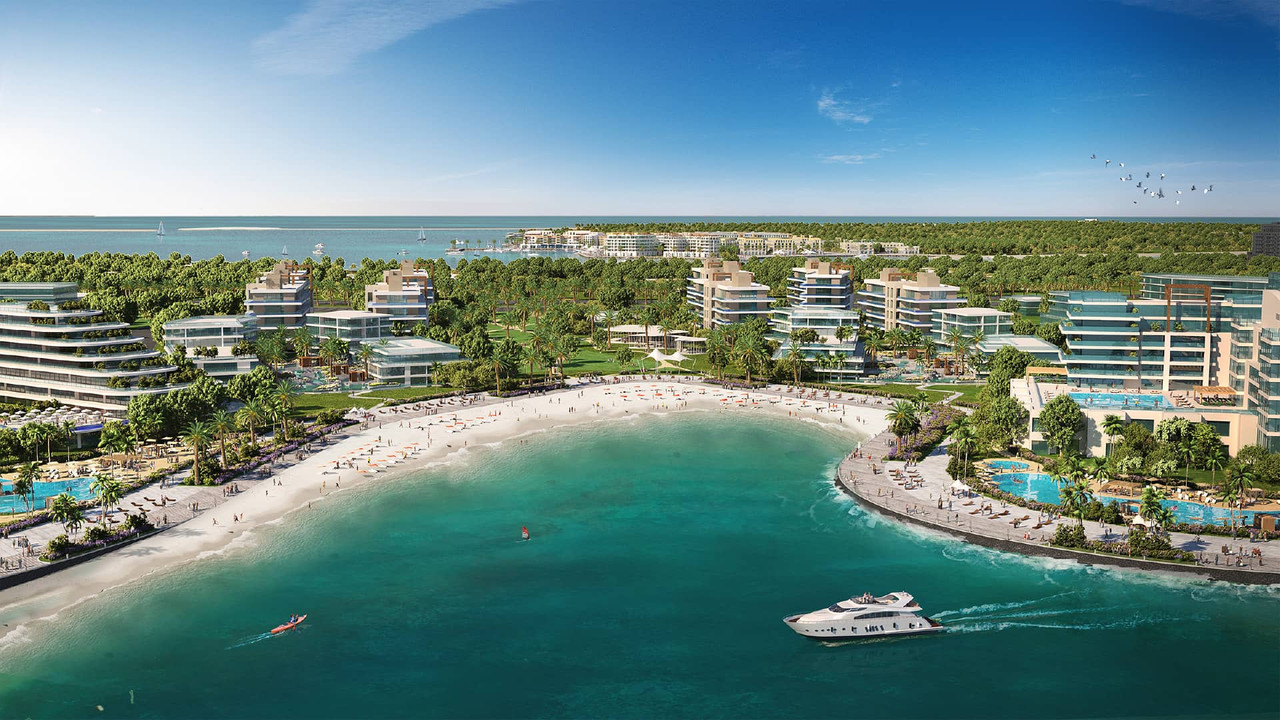 A rendering of Dubai Islands with images of buildings, the ocean and boats.