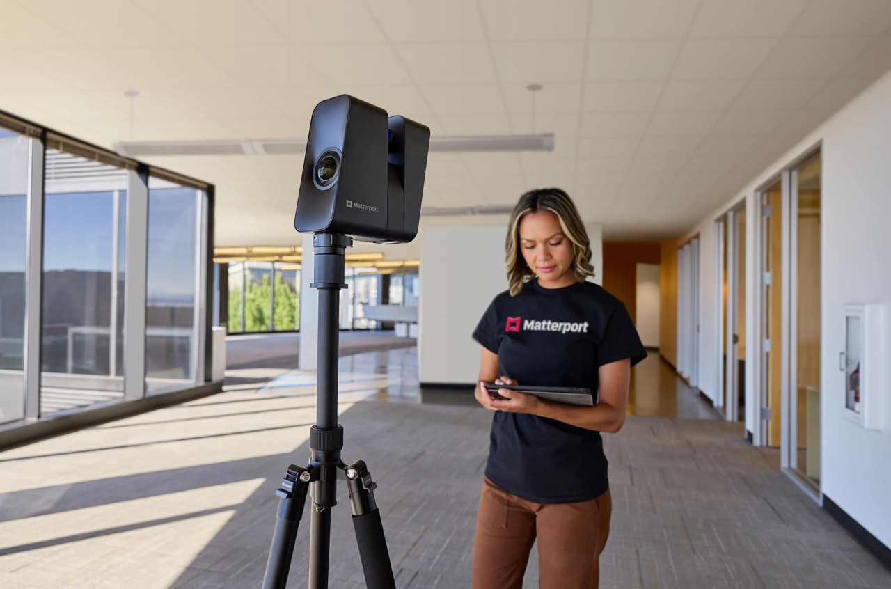 A matterport agent with a matterport camera and tablet